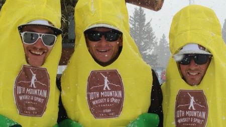 The three faces of the 10th Mountain Whiskey & Spirit Company, including Sylvan Ellefson (l) dressed in corn at Vail's Closing Day. (Courtesy photo)
