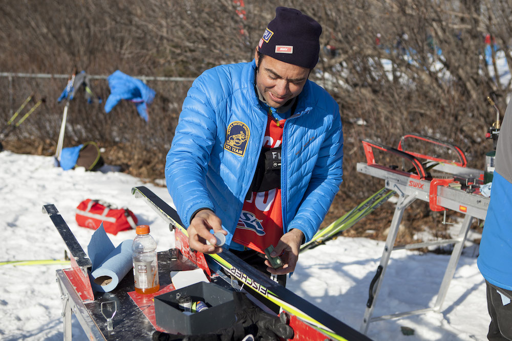 Erik Flora preps skis at the 2014 SuperTour Finals in March in Anchorage, Alaska. (Photo: Chris Hodel)