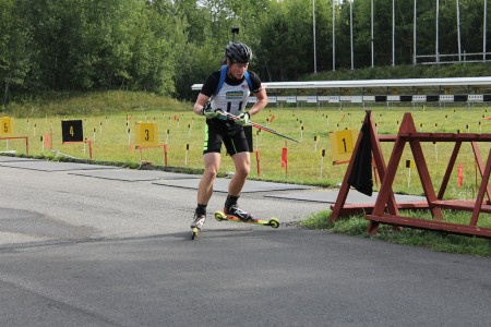 Canada's Scott Gow leaves the range in the men's 10 k sprint at the 2014 North American Rollerski Championships in August at the Ethan Allen Firing Range in Jericho, Vt.
