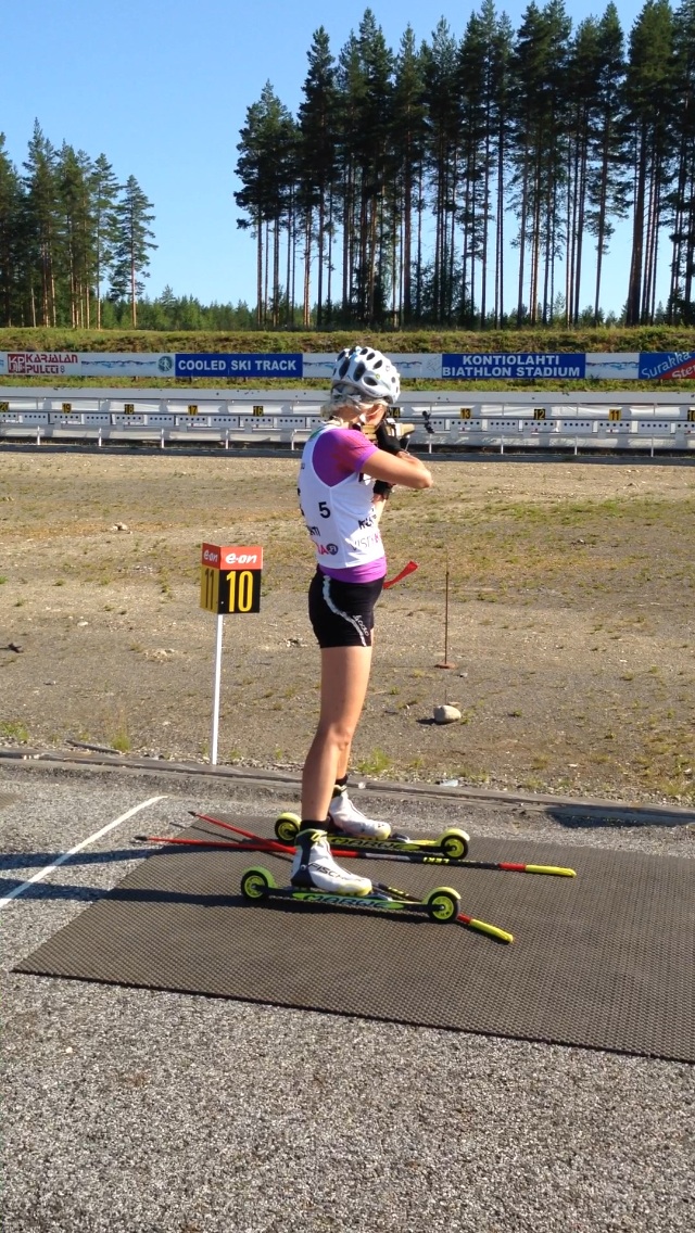 Finnish biathlete Kaisa Mäkäräinen shooting at her home course in Kontiolahti, Finland, where she hosted the U.S. women's team in late July. (Photo: Jonne Kähkönen)