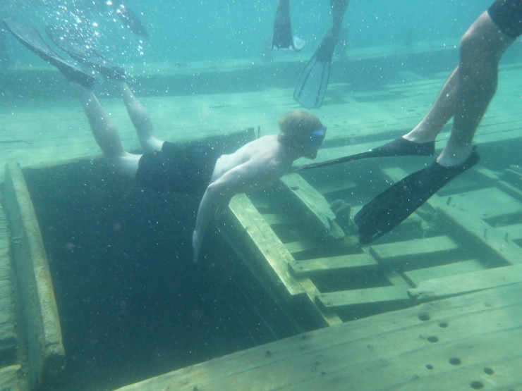 Team Hardwood explores shipwrecks in Big Tug Harbour. (Photo: Patricia MacDonell)