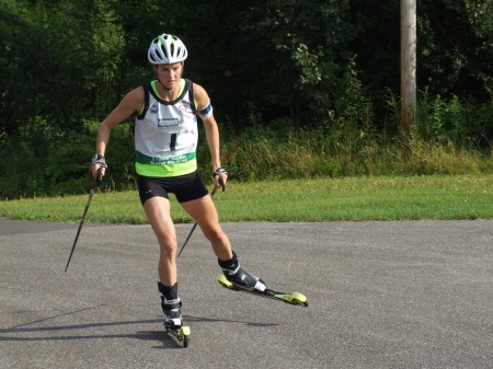 Clare Egan racing to first in the the 2014 North American Rollerski Championships junior pursuit at the Ethan Allen Firing Range in Jericho, Vt. (Photo: Gordon Vermeer/Flickr) https://www.flickr.com/photos/126844827@N08/sets/72157646342384384/page2/