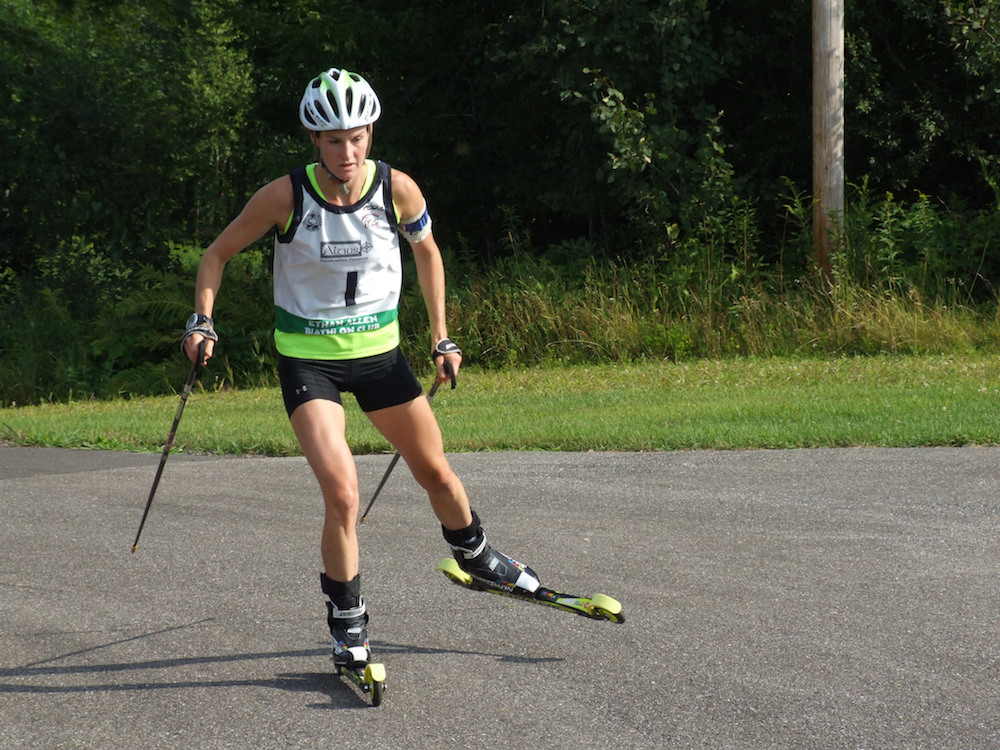 Clare Egan racing to first in the the 2014 North American Rollerski Championships junior pursuit at the Ethan Allen Firing Range in Jericho, Vt. (Photo: Gordon Vermeer/Flickr) https://www.flickr.com/photos/126844827@N08/sets/72157646342384384/page2/