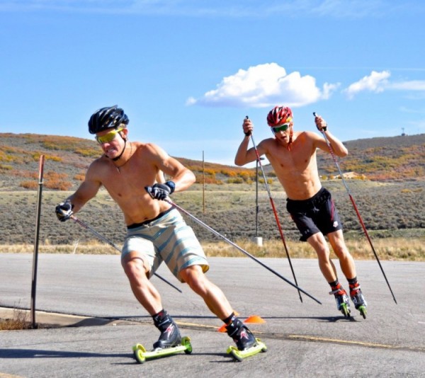 Miles Havlick of SVSEF (l) and Erik Bjornsen (USST/APU) maneuver a corner while rollerkiing at Soldier Hollow. (Photo: USSA) 