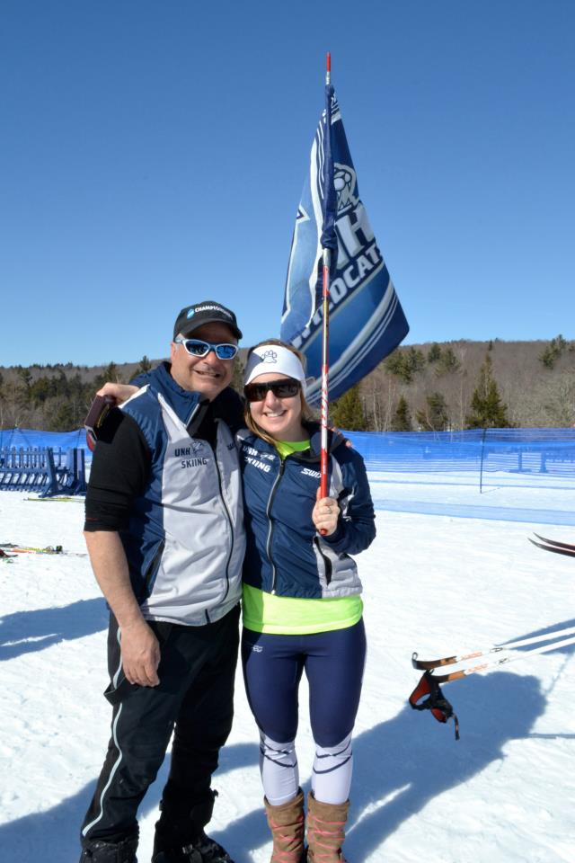 Cory Schwartz (l) and Anya Bean (r) pose with the University of New Hampshire flag. (Photo: Cory Shwartz) 