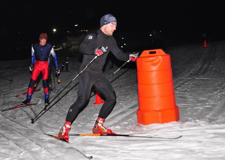 Skiers round a corner while night skiing at the Weston Ski Track in Weston, Mass. (Photo: Jamie Doucett)