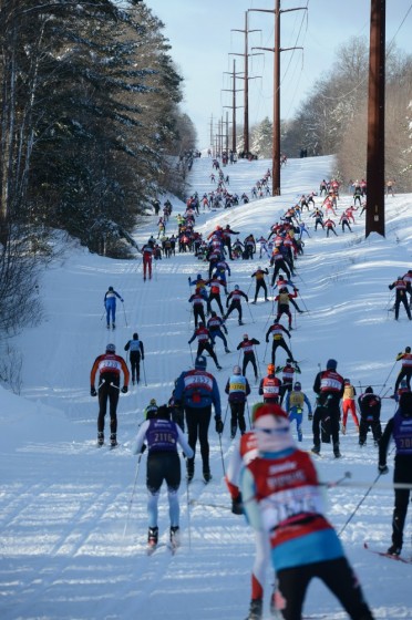 Signing up for a big race (like the Birkie), attending a regular training group, or even having a once-a-week workout with a friend can provide huge motivation for people to stay active. Photo: American Birkebeiner Ski Foundation.