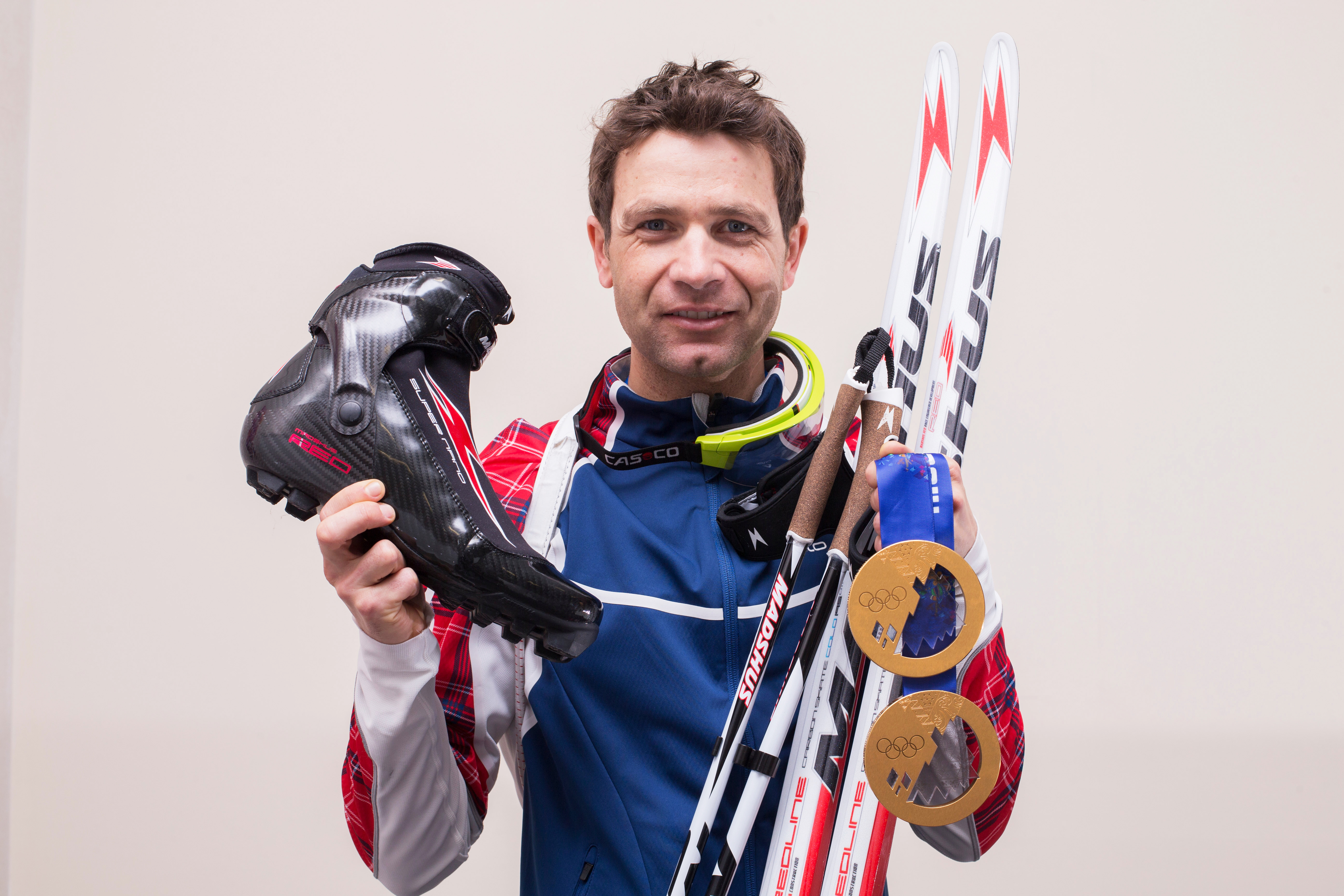 Ole Einar Bjørndalen with his two gold medals from Sochi. With two decades of receiving the very best skis on the circuit and building a fleet, he could afford to skip using his best pair in Ostersund and saving their bases from the rocks that littered the trails, and still rack up the second-fastest ski time in Saturday's race. (Photo: Madshus/NordicFocus)