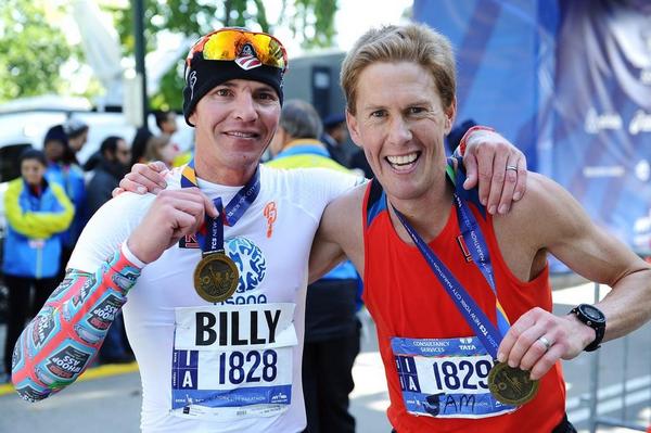 Billy Demong (US Nordic Combined) and friend Sam Krieg (r) pose after finishing the 2014 NYC Marathon. Demong placed 52nd with a time of 2:33:06. (Photo: Drea Braxmeier, NYRR) 