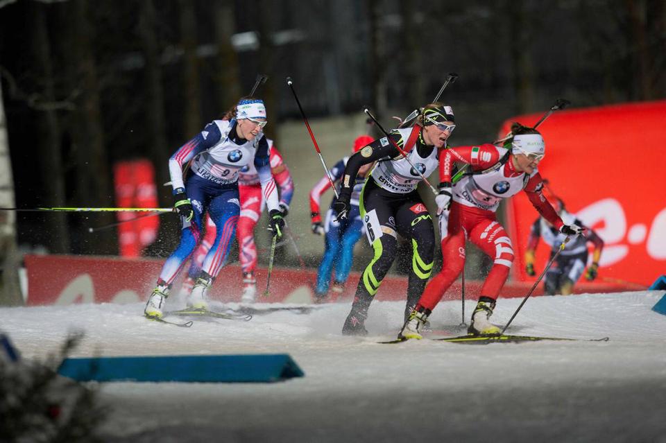 Susan Dunklee (left) in the thick of things for the United States in the first leg of today's World Cup mixed relay in Östersund, Sweden. The team finished seventh. Photo: NordicFocus.com via USBA.