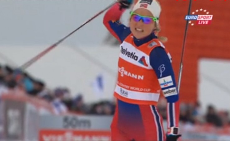 Therese Johaug celebrates her dominant performance in Sunday's 10 k classic in Kuusamo, Finland, which she won by more than 42 seconds over Norwegian teammate Marit Bjørgen.