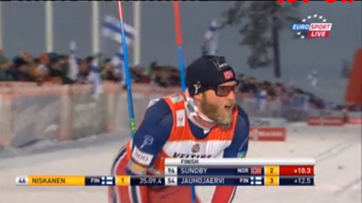 Sundby finishing and looking up to confirm he placed second in Sunday's World Cup 15 k classic in Kuusamo, Finland.