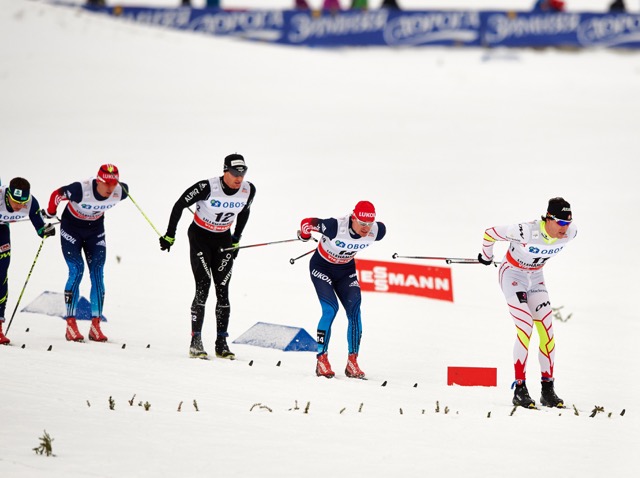 Alex Harvey (r) of Canada leads (r-l) Russian Mixim Vylegzhanin, Dario Cologna of Switzerland, and Evgeniy Belov of Russia in Sunday's 15 k classic pursuit in Lillehammer, Norway. He finished in 10th position in the mini tour.  