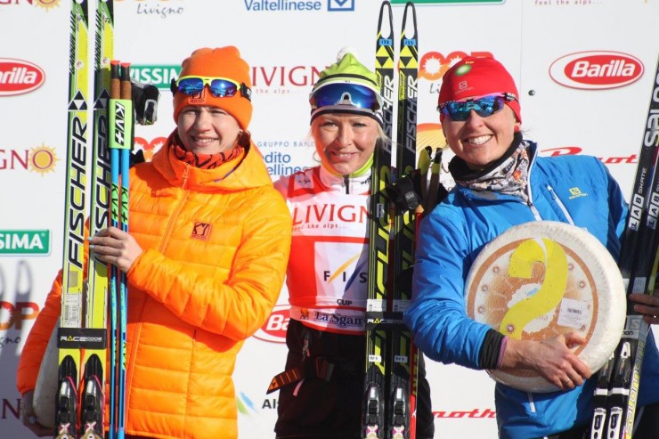 The La Sgambeda women's podium on Friday in Livigno, Italy: with Finnish winner Riitta-Liisa Roponen (c), who notched her third-consecutive victory at La Sgambeda, American Holly Brooks (r) in second, and Ekaterina Rudakova of Belarus in third. (Photo: Worldloppet/FIS Marathon Cup)