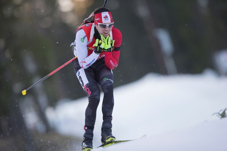 Canada's Nathan Smith racing to ninth in Saturday's IBU World Cup 10 k sprint in Östersund, Sweden. Photo: Fischer/NordicFocus.