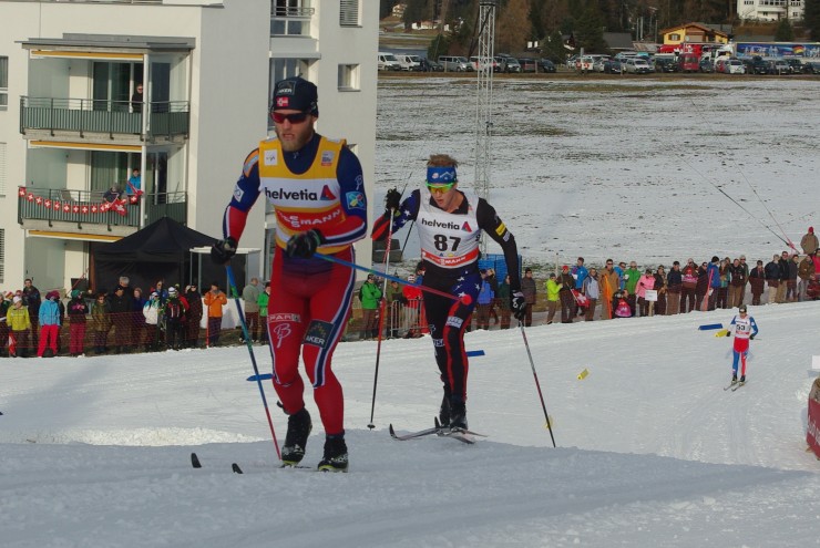 Martin Johnsrud Sundby (NOR) leading Erik Bjornsen (USA) one lap into the 15 k classic World Cup in Davos.