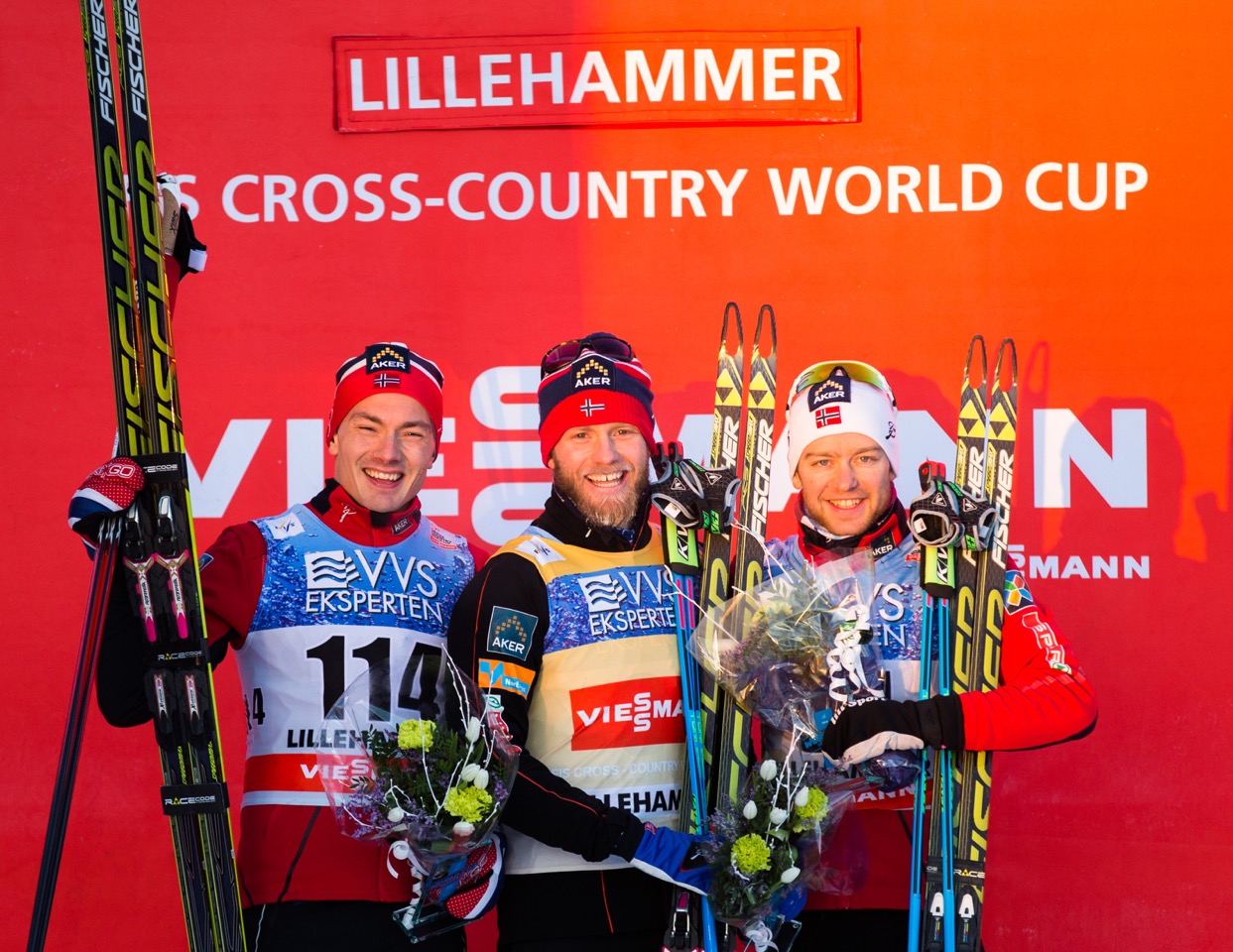 The men's podiums on Day 2 and 3 of the Lillehammer World Cup were exactly the same, with three Norwegians (as pictured after Saturday's 10 k freestyle). On Sunday, Martin Johnsrud Sundby (c) repeated in first for his fourth-consecutive mini-tour win, Finn Hågen Krogh was second (l), and Sjur Røthe third. (Photo: Fischer/NordicFocus)