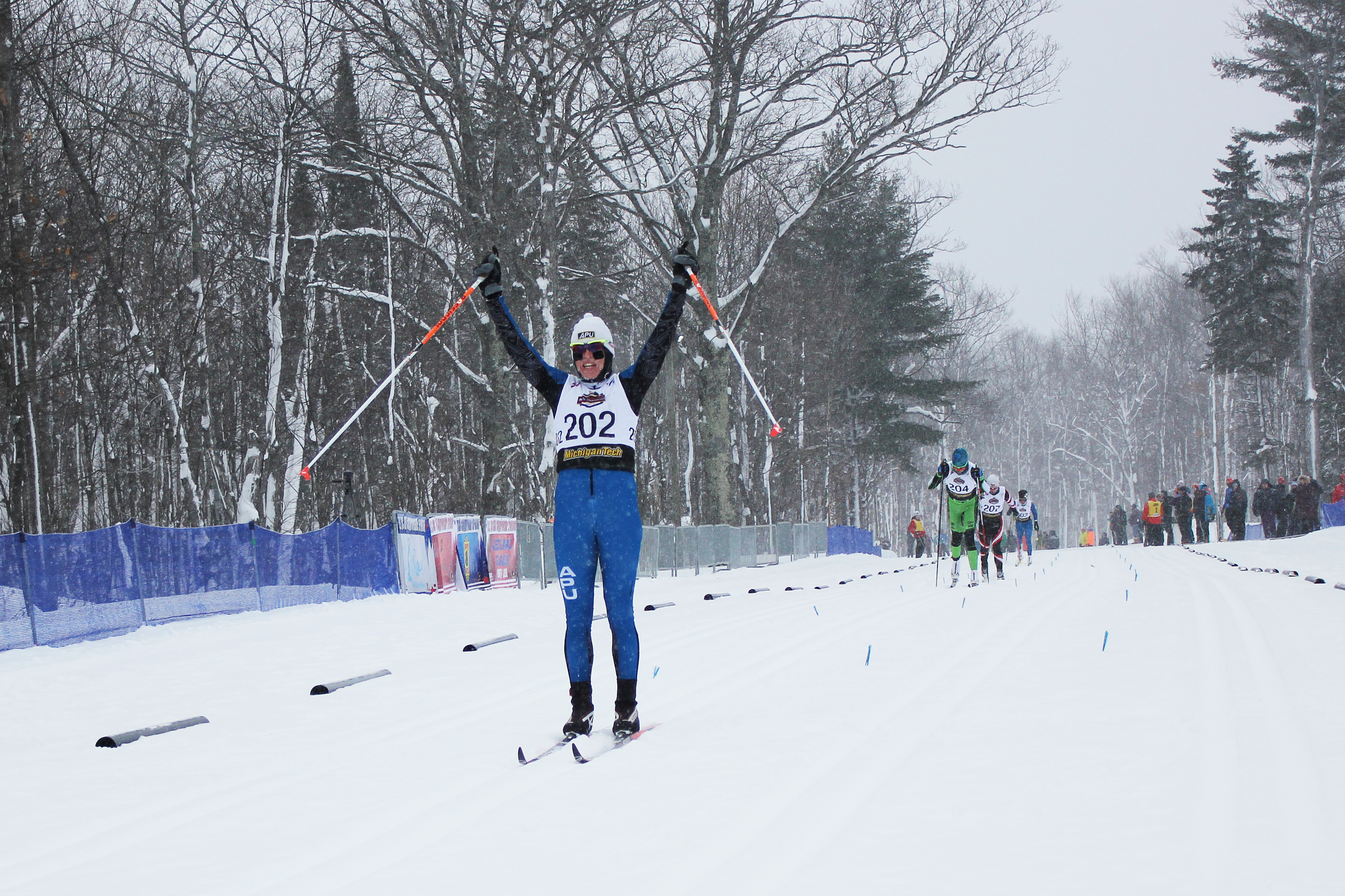 Rosie Brennan (APU) celebrates her win in the 20 k classic mass start at the 2015 U.S. Cross Country Championships in Houghton, Mich. 