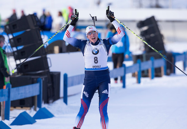 Susan Dunklee celebrating as she crossed the finish line in Antholz, Italy, on Saturday in sixth place in the IBU World Cup pursuit. (Photo: USBA/NordicFocus)