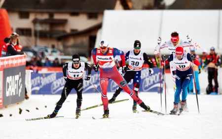 Petter Northug (NOR) controls the pace during the a quarterfinal heat with Len Valjas (CAN), Simeon Hamilton (USA), Ilia Chernousov (RUS) (l-r) following behind. (photo: Fischer/Nordic Focus)