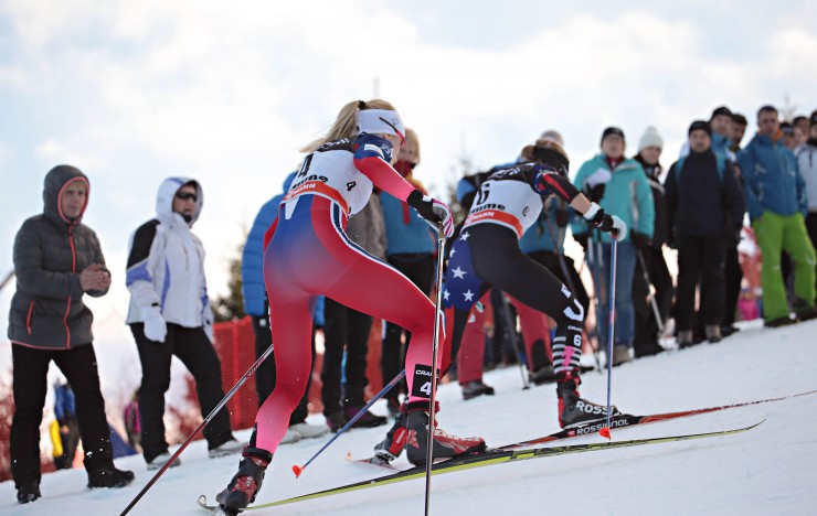 American Liz Stephen leads Norway's Ragnhild Haga during the charge up the final hill of the seventh stage of the 2015 Tour de Ski in Val di Femme, Italy (Photo: Val di Fiemme/www.fiemmeworldcup.com)