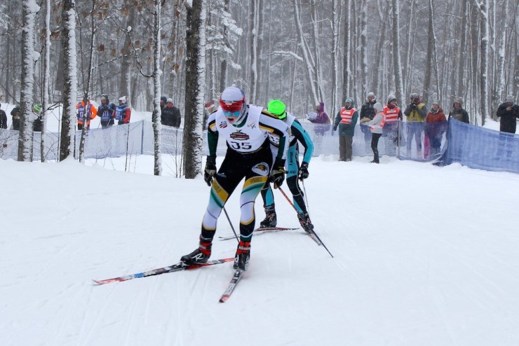 NMU’s Kyle Bratrud leads Brian Gregg (Team Gregg/Madshus) around 5 k in the first of two laps in the men’s 15 k freestyle, the first race of U.S. nationals in Houghton, Mich.