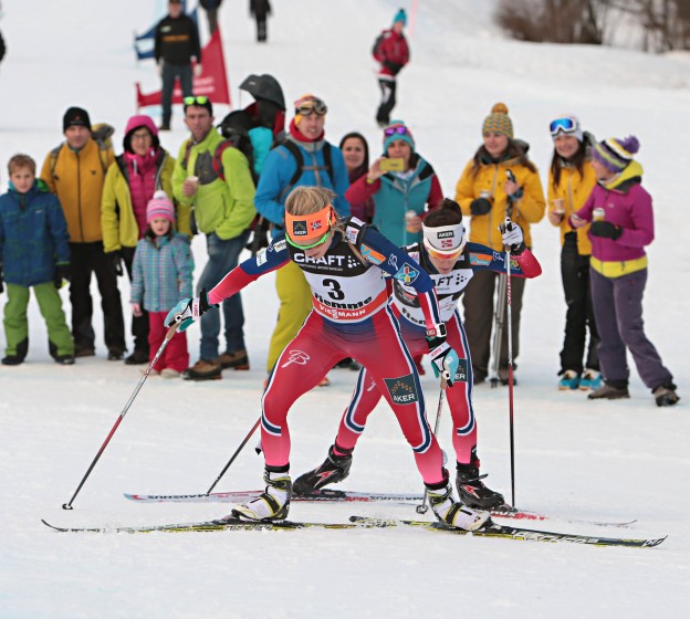 Therese Johaug (bib 3) leads Norwegian teammate Heidi Weng as they race in the final stage of the 2015 Tour de Ski in Val di Fiemme, Italy (Photo: Val di Fiemme/www.fiemmeworldcup.com)
