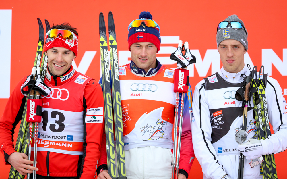 Norway's Petter Northug (center) won Sunday's Tour de Ski 15 k classic pursuit in Oberstdorf, Germany, over Alex Harvey of Canada (left) and Calle Halfvarsson of Sweden (right). (Photo: Marcel Hilger)