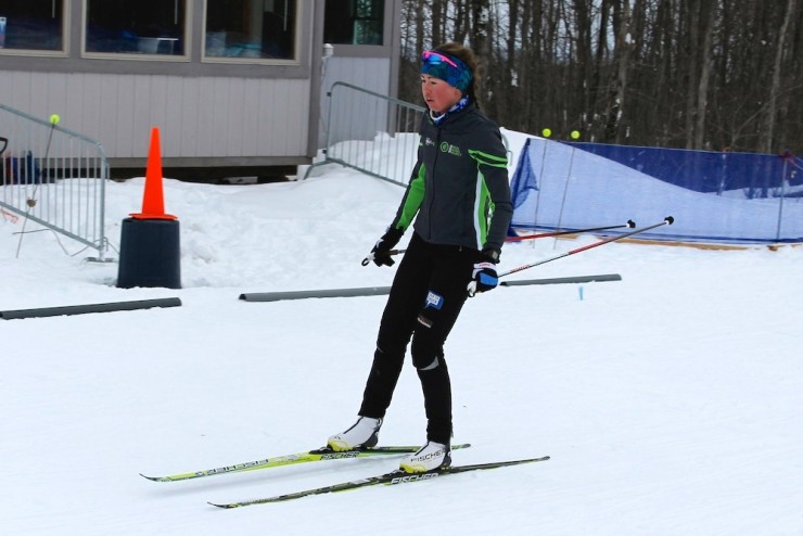 Caitlin Patterson gliding through the finish during Saturday morning race prep at the Michigan Tech Trails in Houghton, Mich. U.S. nationals kick off Sunday in Houghton with the 10/15 k freestyle individual starts.