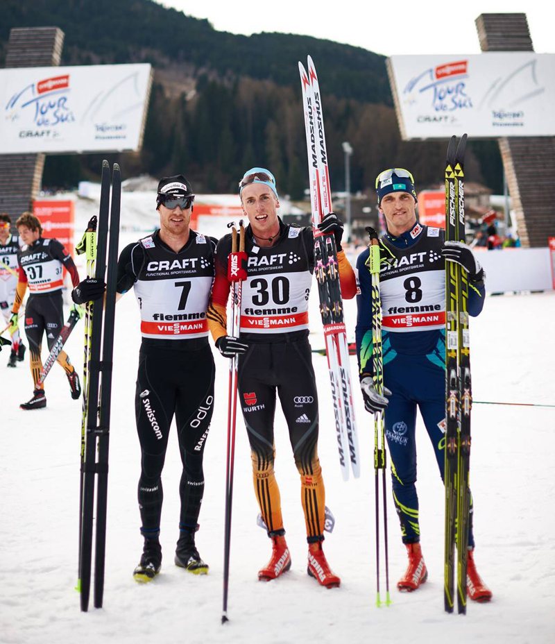 Dario Cologna (SUI), Tim Tscharnke (GER), Alexey Poltoranin (KAZ), (l-r)  take the podium in the men's classic mass start in Val di Fiemme, Italy.  (photo:Fischer/Nordic Focus)