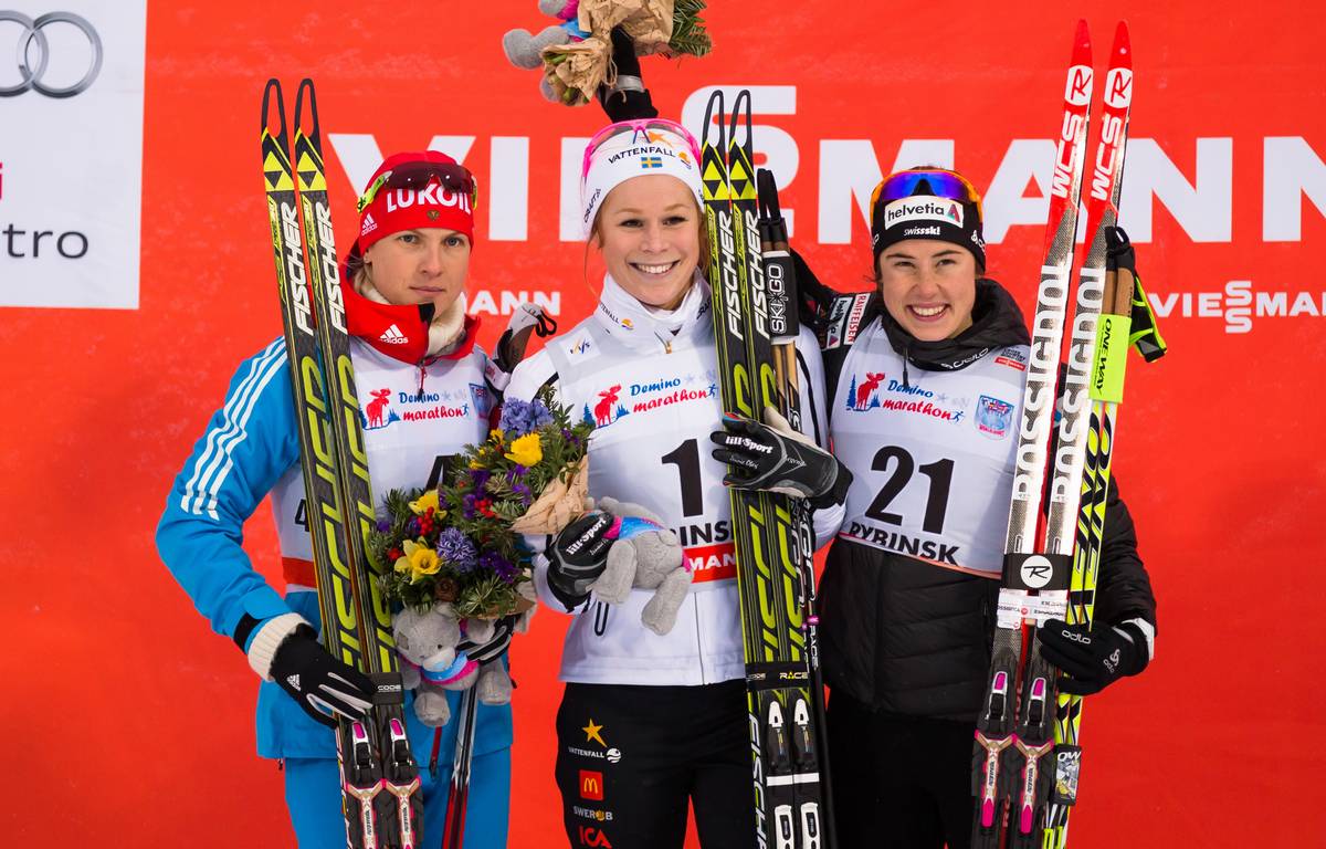The women's podium (from l-r): Natalia Matveeva (RUS)  second, Jennie Öberg (SWE) first, and Laurien van der Graaff (SUI) third.