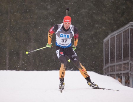 Germany's Arnd Peiffer racing to third in the men's 10 k sprint on Saturday in Ruhpolding, Germany.(Photo: Fischer/NordicFocus)