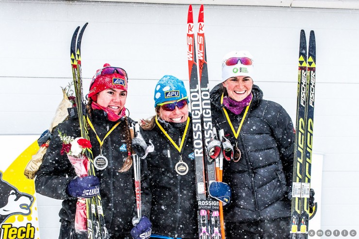 APU's Rosie Brennan (c) and Becca Rorabaugh (l) on the podium in first and second, respectively, and Liz Guiney (Craftsbury Green Racing Project) in third in the women's classic sprint at U.S. nationals in Houghton, Mich. (Photo: Christopher Schmidt)