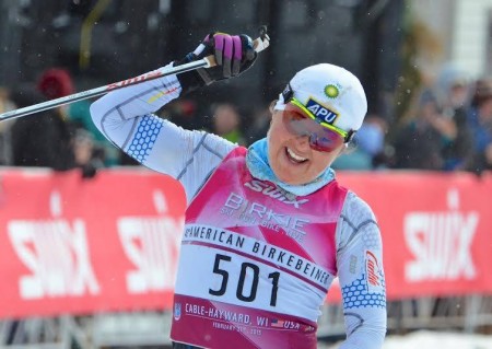 Holly Brooks celebrates after winning her second American Berkebeiner on Saturday in Hayward, Wis. The win put her back in the lead of the overall FIS Marathon Cup. (Photo: American Birkebeiner Ski Foundation) 