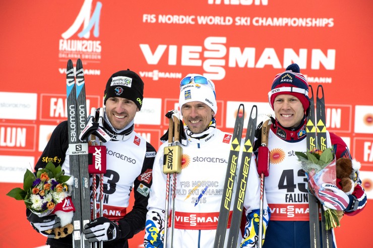 France's Maurice Manificat (l), Sweden's Johan Olsson (c) and Norway's Anders Gløersen (r) in Wednesday's 15 k freestyle podium at the 2015 FIS Nordic World Ski Championships in Falun, Sweden. Olsson won the race by 17.8 seconds over Manificat. Gløersen finished third, 19.2 seconds back. (Photo: Falun 2015)