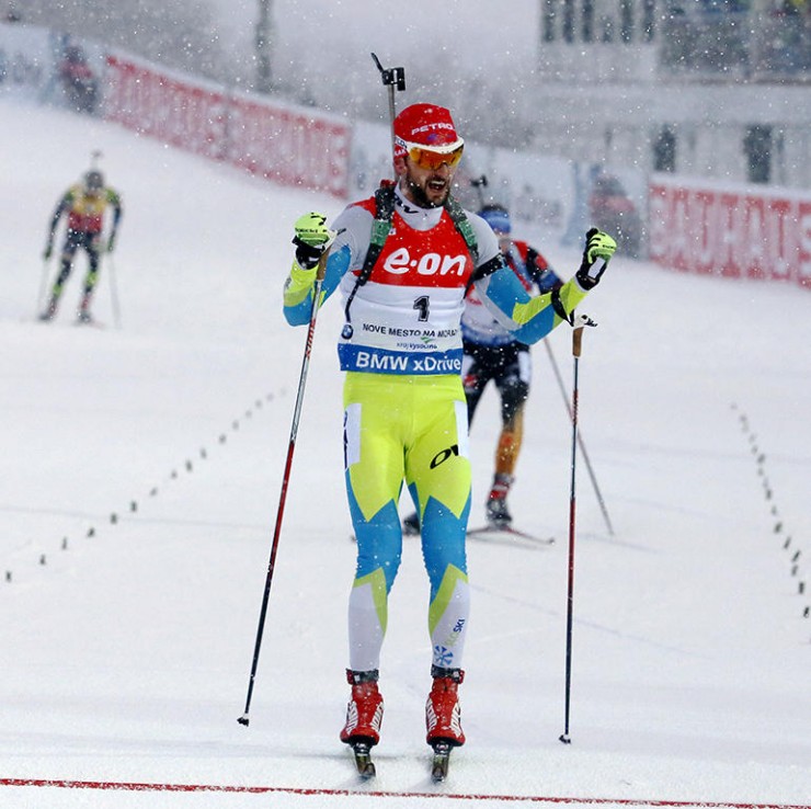 Slovenia's Jakov Fak celebrates his second-straight win with a victory in Sunday's 12.5 k pursuit at the IBU World Cup in Nove Mesto, Czech Republic. He held off Simon Schempp of Germany and France's Martin Fourcade, respectively. (Photo: IBU/Květoslav Frgal)