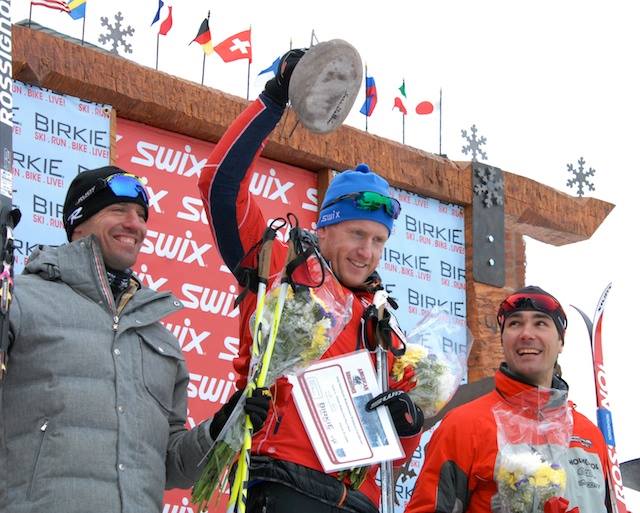 Men's 55 k classic Birkie winner Ole Christian Mork (c) is with second-place finisher Torin Koos (l) and Thomas Seidel (r), who placed third. (Photo: ABSF)