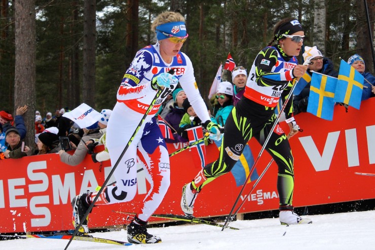 Jessie Diggins of the United States skiing with Celia Aymonier of France early on in the 30 k classic race. Diggins later dropped out.