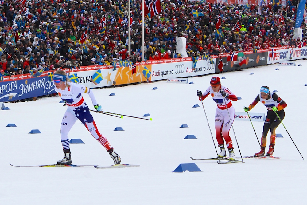 American anchor skier Jessie Diggins leading Poland's Sylwia Jaskowiec and Germany's Nicole Fessel with 2.5 kilometers left to go in the women's World Championship relay in Falun, Sweden.