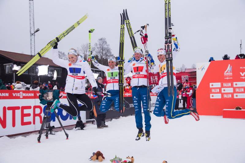 Stina Nilsson, Charlotte Kalla), Sofia Bleckur, and Maria Rydqvist (l-r) jump after placing second in the women's 4 x 5 k relay at the 2015 FIS Nordic World Ski Championships. (Photo: Fischer/NordicFocus)  