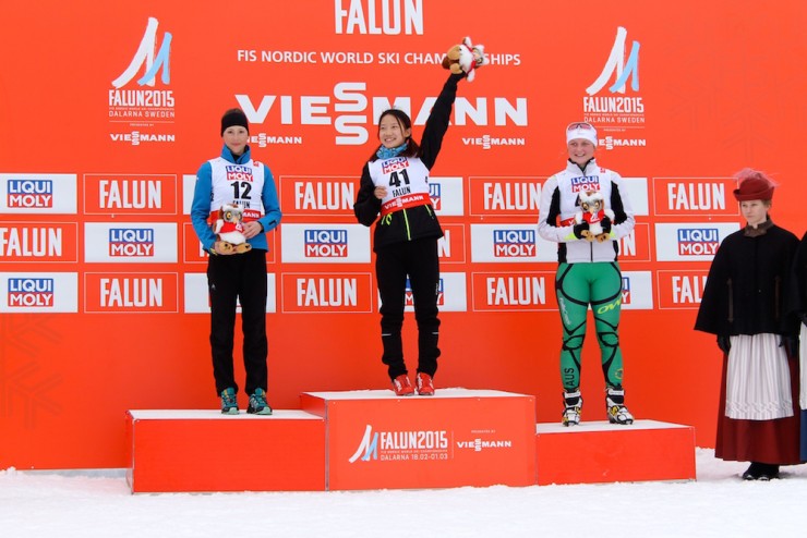 Seventeen-year-old Chi Chunxue celebrates her qualifying win on Wednesday in the women's 10 k freestyle, which advanced her along with the top 10 to the remaining distance races at 2015 FIS Nordic World Ski Championships in Falun, Sweden.Bosnia and Herzegovina's Tanja Karisk placed second (+49.3) and Australia's Casey Wright was third (+1:07.5). 