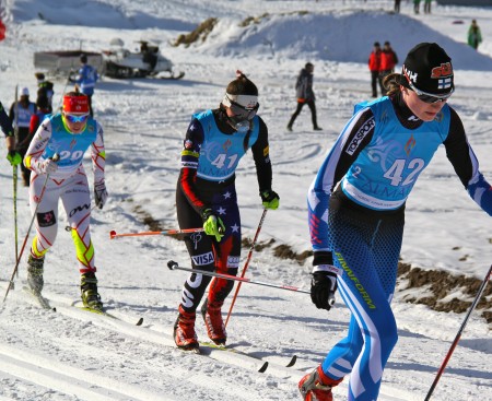 Julia Kern, wearing a mask because of air-quality concerns, on her way to 38th place in the 10 k skiathlon at Junior Worlds in Almaty, Kazakhstan (Photo: Bryan Fish/USSA)