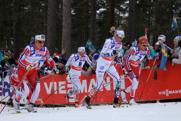 Sofia Bleckur of Sweden (center) leading the race early up Little Mordarbacken with Norway's Marit Bjørgen (near) and Therese Johaug (2).