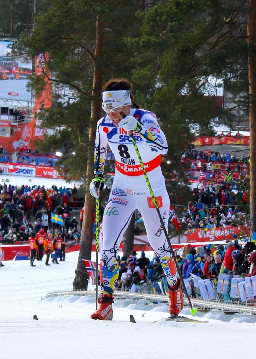 Charlotte Kalla charging alone to third place and a bronze medal in the 30 k classic in Falun, Sweden.