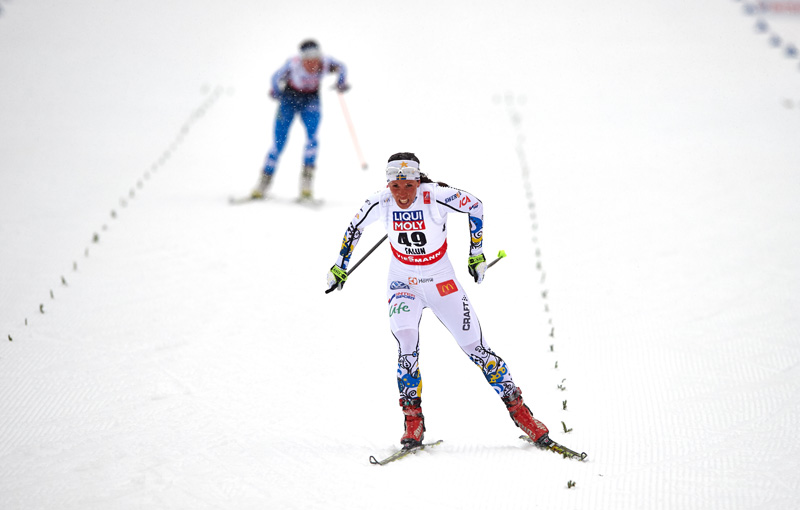 Charlotte Kalla of Sweden skiing to a monster win in the 10 k skate at 2015 World Championships on home turf in Falun, Sweden. (Photo: Fischer/NordicFocus.com)
