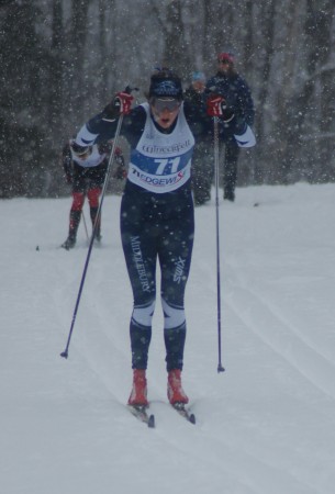 Heather Mooney (Midd) powers to a snowy win in the 5k classic 
