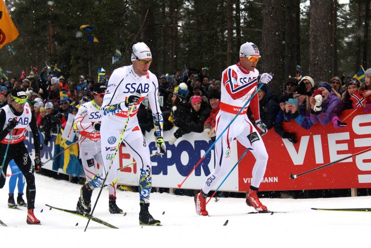 Daniel Richardsson of Sweden and Niklas Dyrhaug of Norway leading the men's 4 x 10 k relay in Falun, Sweden. 