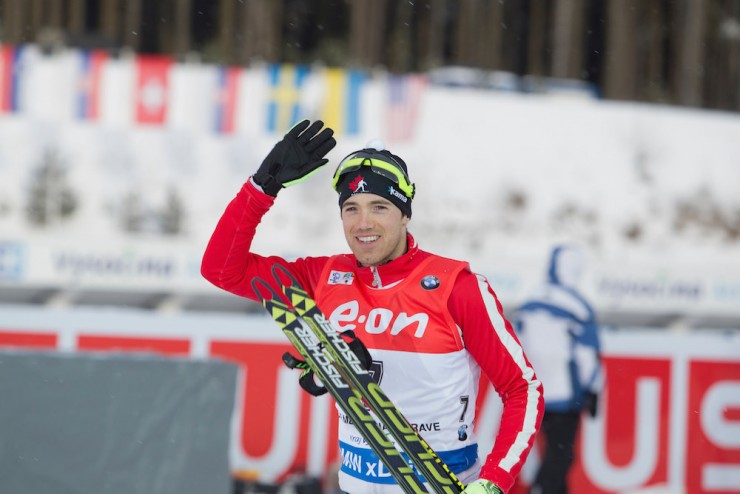 Canada's Nathan Smith at his first-ever awards ceremony after placing a career-best fifth on Sunday in the IBU World Cup 12.5 k pursuit in Nove Mesto, Czech Republic. (Photo: Biathlon Canada/NordicFocus)