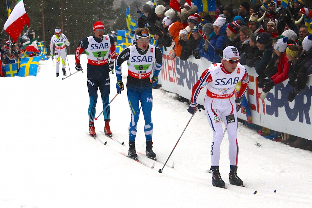 Didrik Toenseth of Norway leading Iivo Niskanen of Finland and Alexander Bessmertnykh of Russia in the men's 4 x 10 k relay at 2015 World Championships.