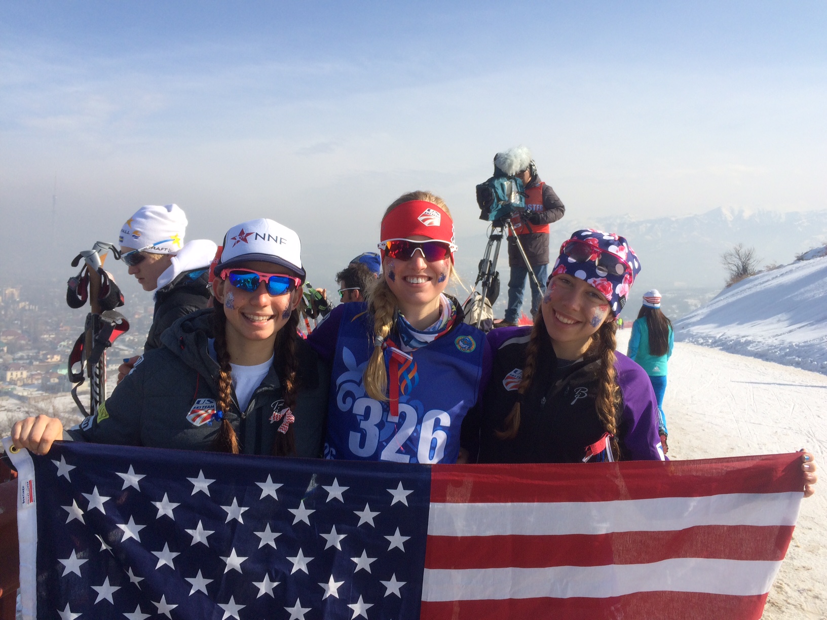 From l-r, Julia Kern (CSU), Hailey Swirbul (Aspen Valley), and Katharine Ogden (SMS) cheering on the U.S. U23 team at World Chamionships in Almaty, Kazakhstan. Kern and Ogden were named to the U.S. Ski Team's "D" team this spring. (Photo: Julia Kern) 